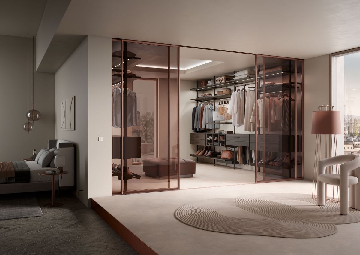 Vestidor moderno con iluminación y amplio almacenaje